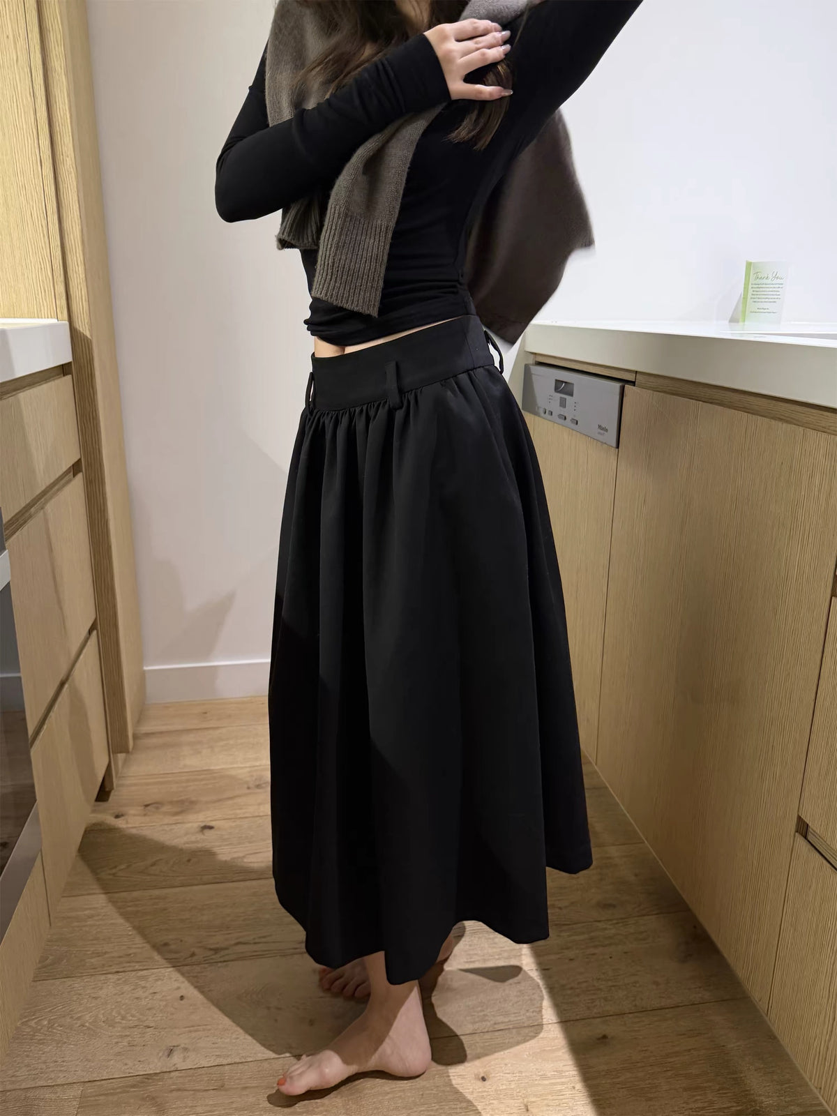 Élan Pleated Midi Skirt